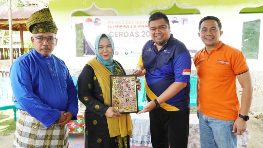 Syah Afandin Dukung Pengabdian Internasional Cerdas 2025, Pererat Kolaborasi Langkat–Malaysia