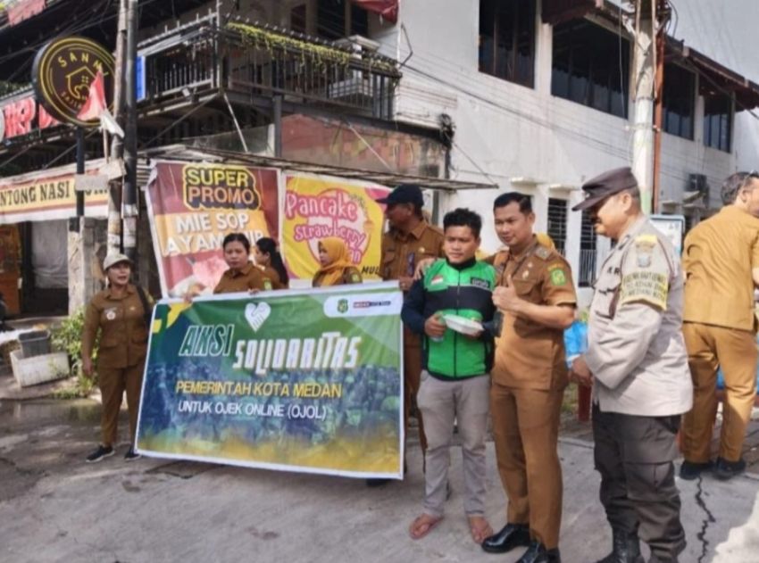 Lurah Teladan Barat, Juni Hardian Komandoi Pembagian 300 Paket Sarapan Gratis Untuk Ojol
