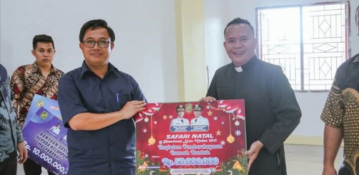 Plt Kadis SDABMBK Hadiri Safari Natal Pemko Medan Di Gereja ST.Fransiskus Xaverius Simalingkar B
