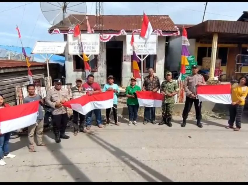 Polsek Munte Bersama Forkopimcam Bagikan Bendera Merah Putih