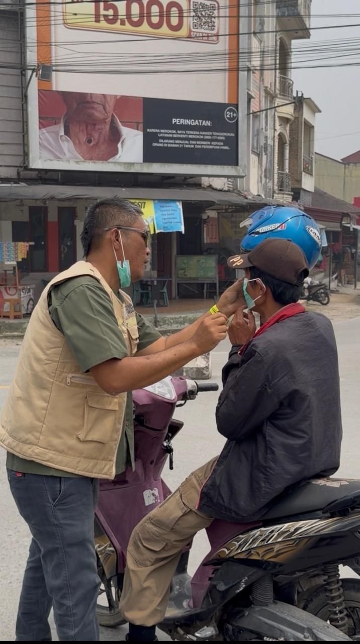 Yayasan Pelita Kita Bersama dan Dinkes Taput Turun ke Jalan Bagikan 6.000 Masker Gratis kepada Masyarakat