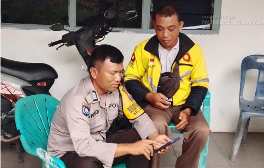 Bhabinkamtibmas Polsek Siantar Selatan Data Warga Masuk ke Aplikasi Parlinsos